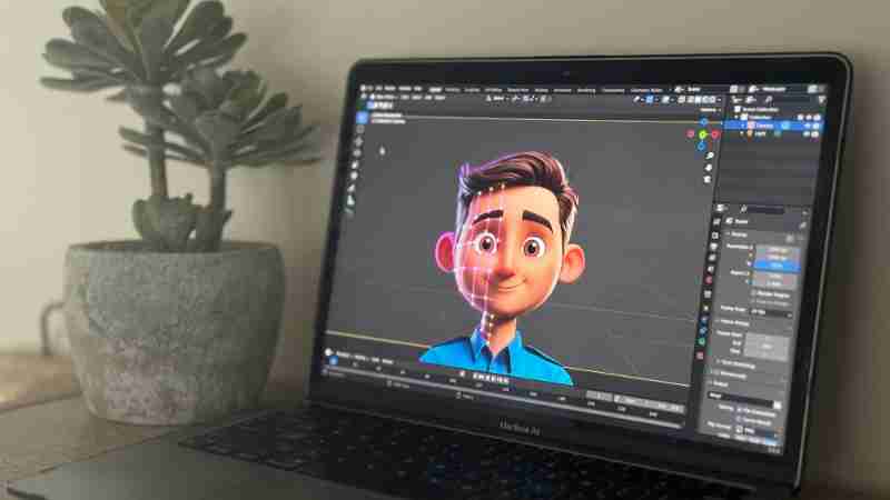Laptop showing 3D animation in creative workspace with succulent plant., tags: modellazione scultura - pexel